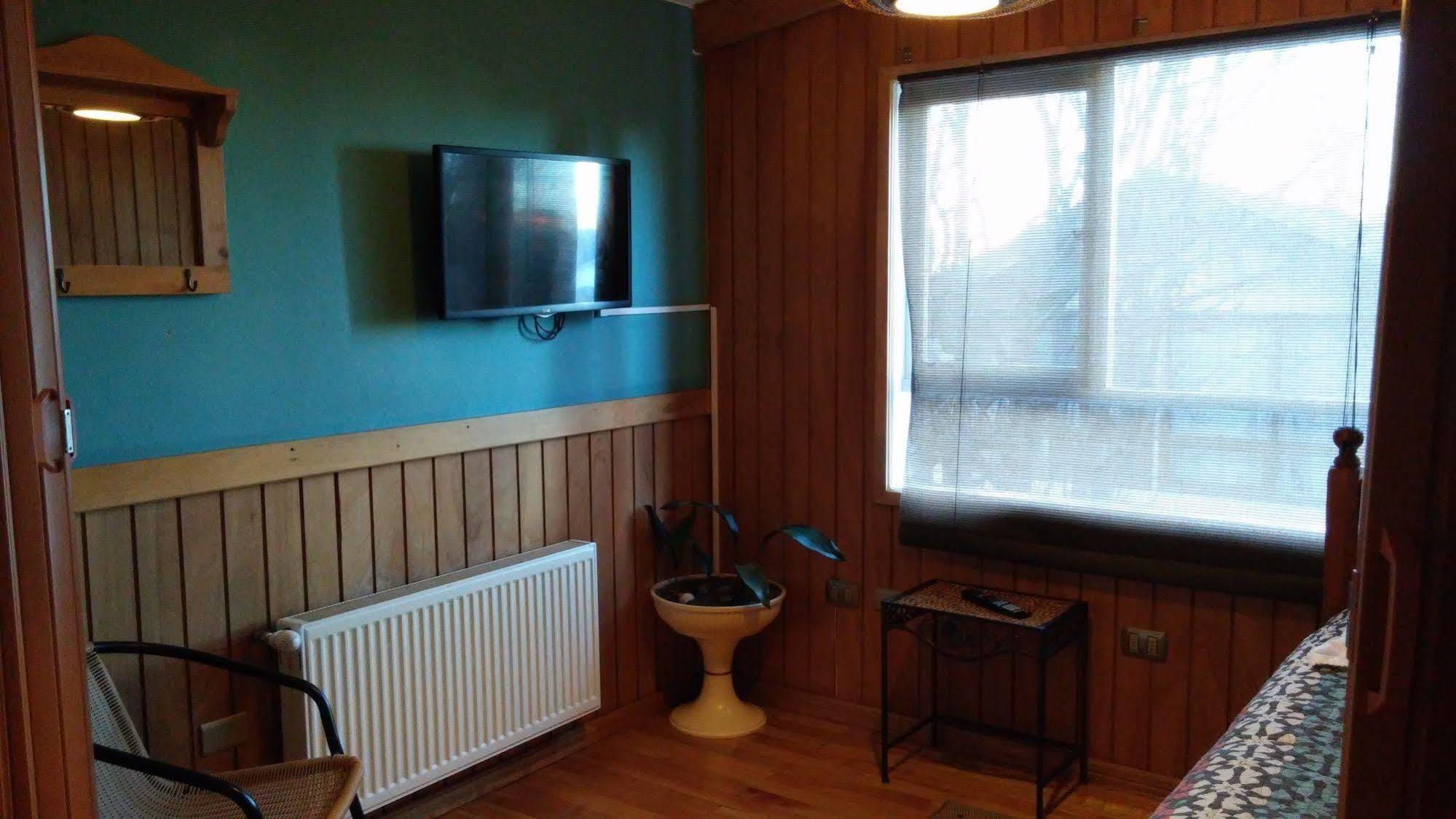 Hostal Y Cabanas Ainil 蓬塔阿雷纳斯 外观 照片