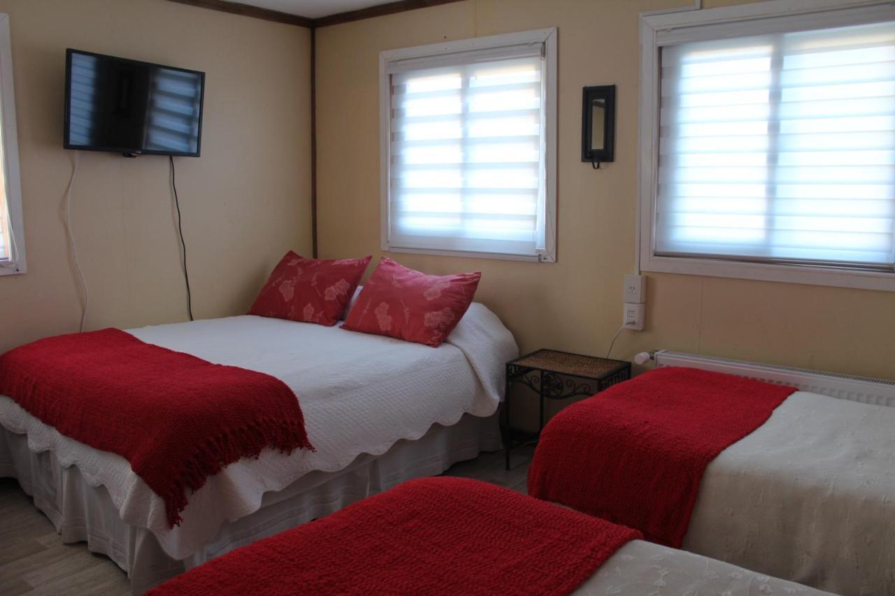 Hostal Y Cabanas Ainil 蓬塔阿雷纳斯 外观 照片