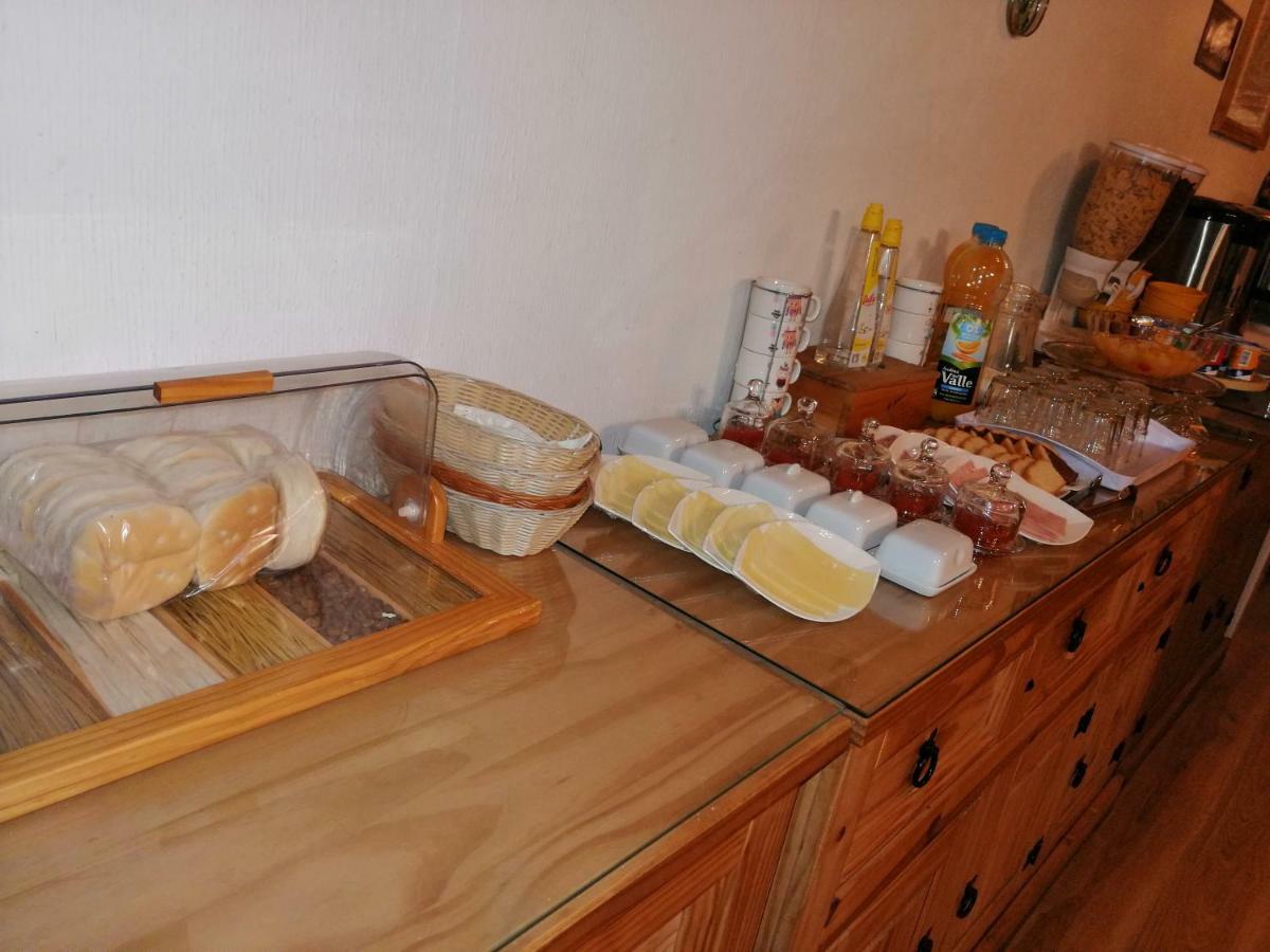 Hostal Y Cabanas Ainil 蓬塔阿雷纳斯 外观 照片